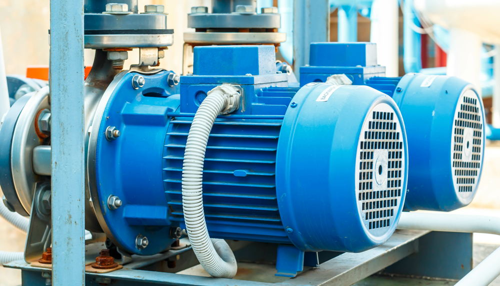 A row of blue Industrial Water Pumps.